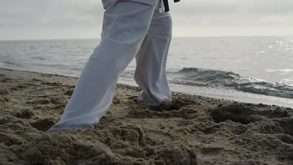 Closeup Man Feet Stepping on Sand Training Karate