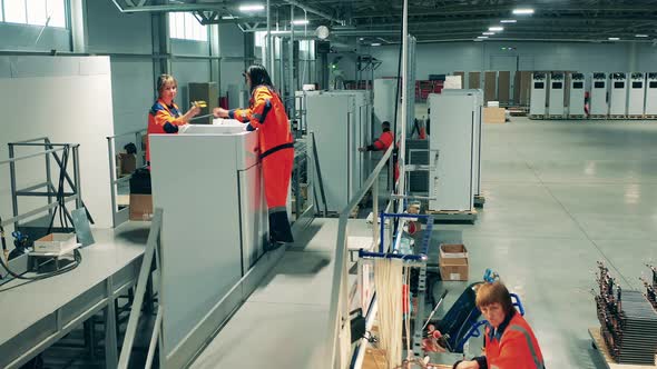 Factory Employees Are Working Refrigerators