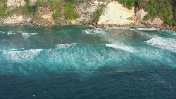 Motion Over Turquoise Water Surface and Waves Rolling in Bay