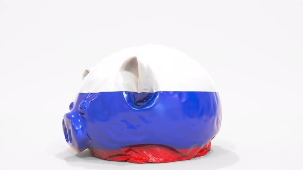 Deflating Inflatable Piggy Bank with Flag of Russia