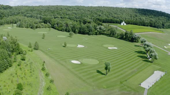 Aerial View Drone Flying Over Golf Club in Summertime Sunlight