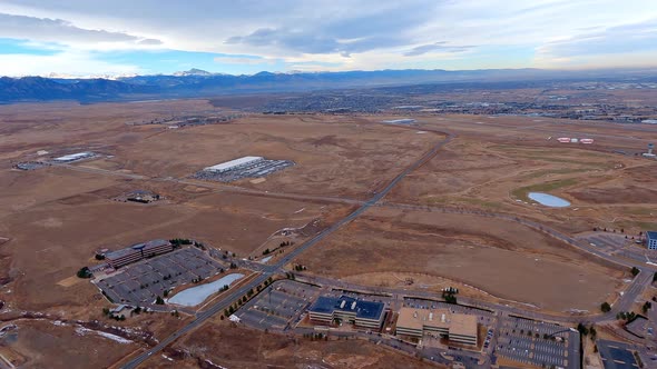 View of Rocky Mountain Metropolitan Airport from an airplane flying the downwind leg with Longs Peak