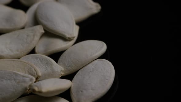 Cinematic, rotating shot of pumpking seeds - PUMPKIN SEEDS 012