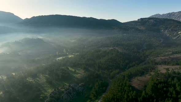 Foggy morning in the mountains aerial view 4 K Turkey