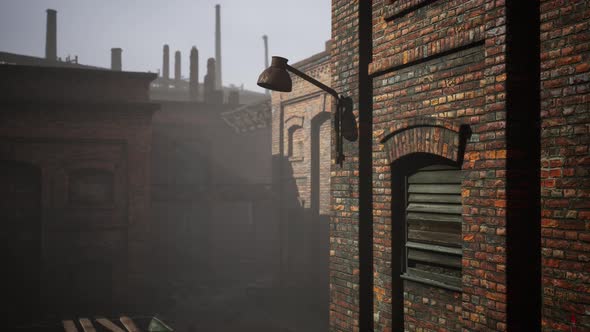 Abandoned Industrial Factory Buildings at Sunset alt