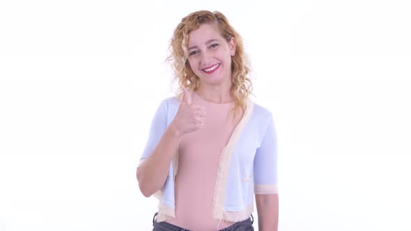 Happy Beautiful Blonde Woman Giving Thumbs Up