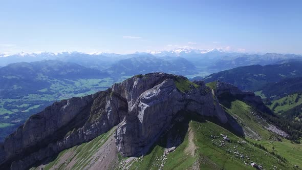 Flying Above Mountain Panorama Overlooking Swiss Alps in Switzerland