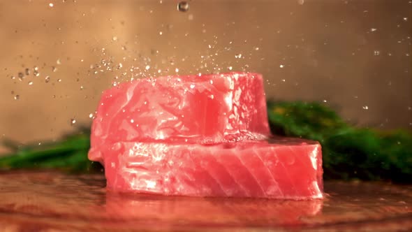 Super Slow Motion on Raw Tuna Steaks Drops Water