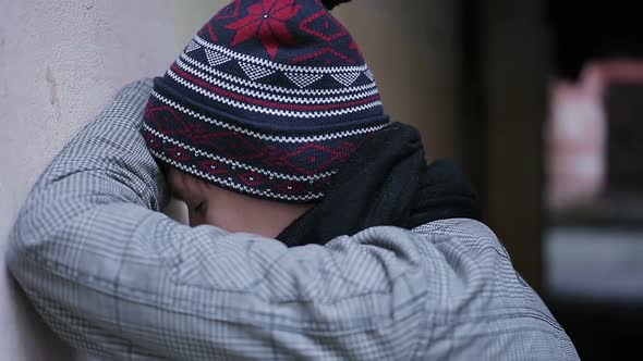 Depressed Young Male Hiding Sad Face in His Hands, Suffering From Hopelessness