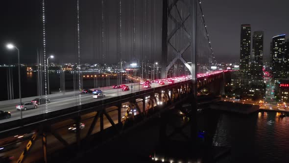  Aerial Night Scene. Epic Aerial Shot of Traffic on the Two-level Cable Bridge alt