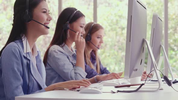 Customer Support Agent or Call Center with Headset Talking to Customer on Phone / Videohive, Stock footage, Business corporate