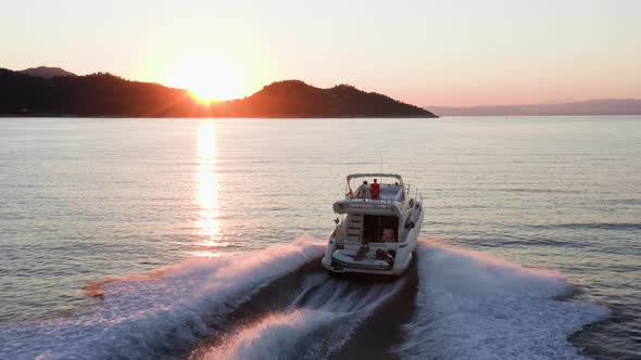 Fast moving motor yacht at the sea.