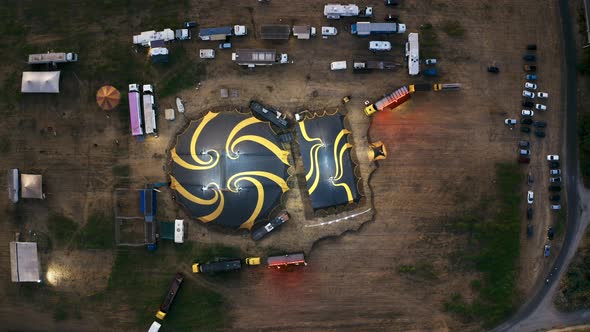 Big Top of a Circus with Caravans in a Field