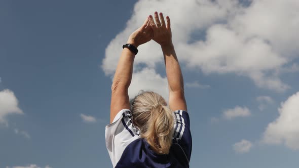 Active Mature Senior Woman Doing Sports Cool Down Take Deep Breath Hands Up