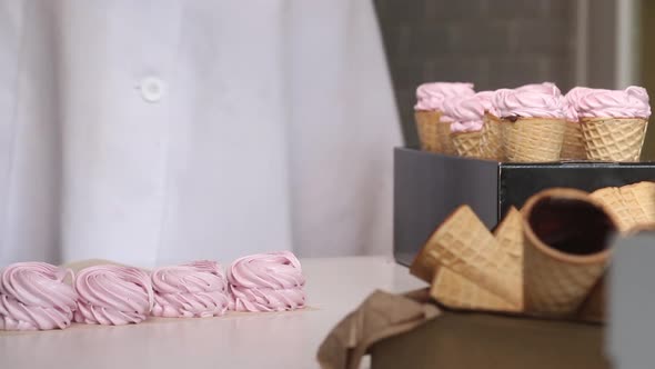 Wafer Cones With Marshmallow Mass. They Are On Stands.