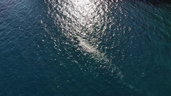 Aerial View of a Moving Fishing Boat in the Ocean