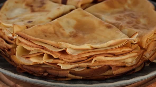 sweet pancakes or French crepes close up rotating