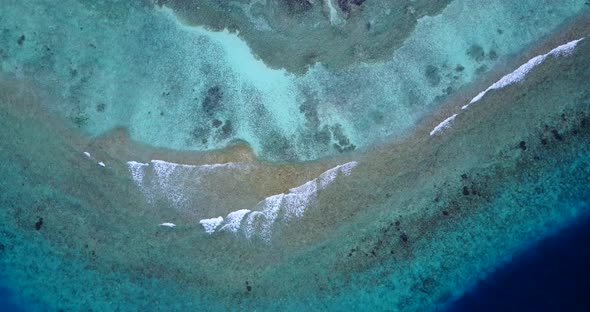 Beautiful overhead abstract view of a summer white paradise sand beach and turquoise sea background 