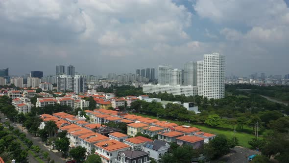 Ultra modern city development with residential and commercial high rise buildings, villas, green spa
