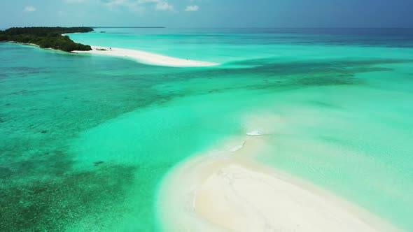 Aerial top down landscape of exotic sea view beach holiday by blue lagoon and white sandy background