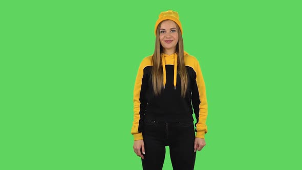 Modern Girl in Yellow Hat with Shocked Surprised Wow Face Expression. Green Screen