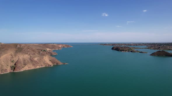 Flying Over a Lake with Islands and Rocks