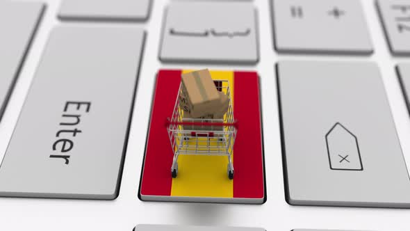 Boxes with MADE IN SPAIN Text and Shopping Cart on the Keyboard alt