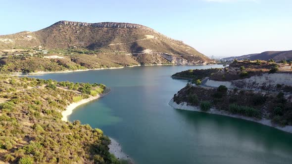 Flying Over Stunning Germasogeia Dam Towards High Green Mountains, Limassol City, Cyprus