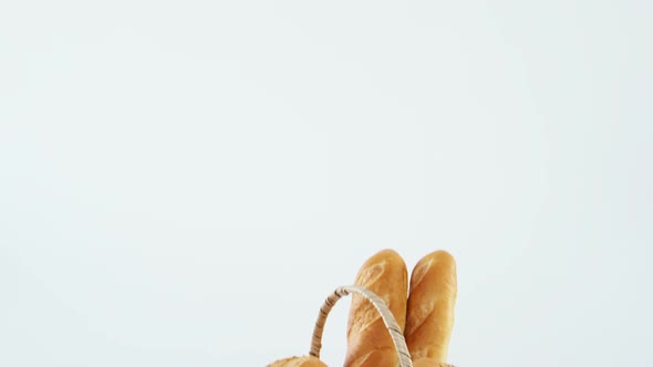 Various types of bread in wicker basket