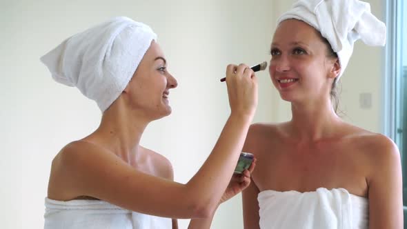 Beautiful Woman Having a Facial Treatment at Spa