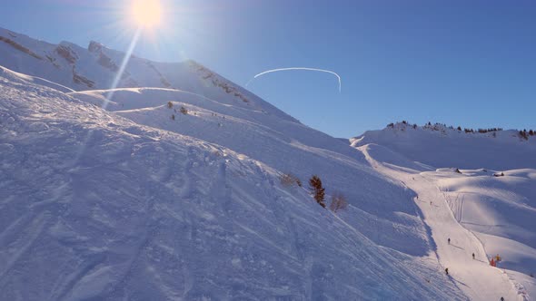 ski area in the Swiss alps with people and chairlifts in the winter ski area of ​​Beckenried