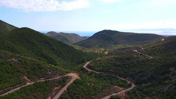 Mountainous landforms blanket the sky