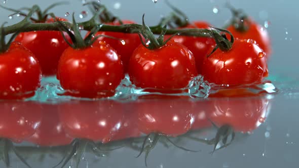 Tomatoes Falling to Water in Super Slow Motion Shot with High Speed Cinema Camera in   1000Fps