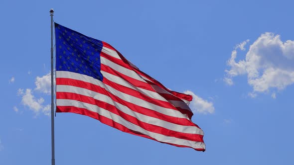 The flag of the United States of American blowing in the wind