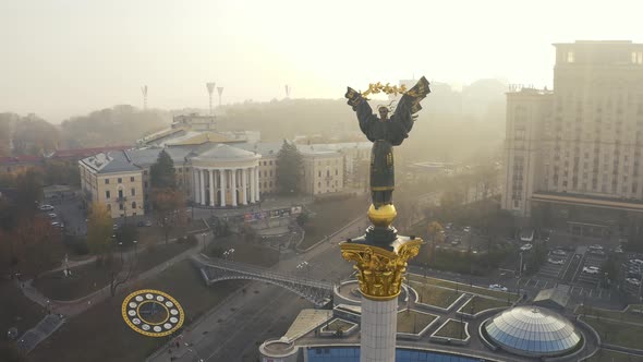 Maidan Nezalezhnosti Square at Foggy Weather. Independence Monument Berehynia in Kiev