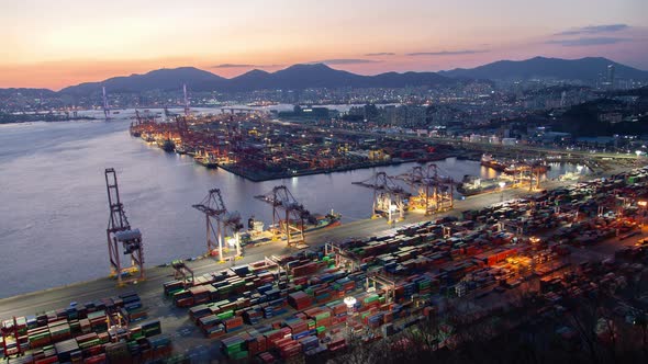 Timelapse Illuminated Cranes and Containers in Busan Port