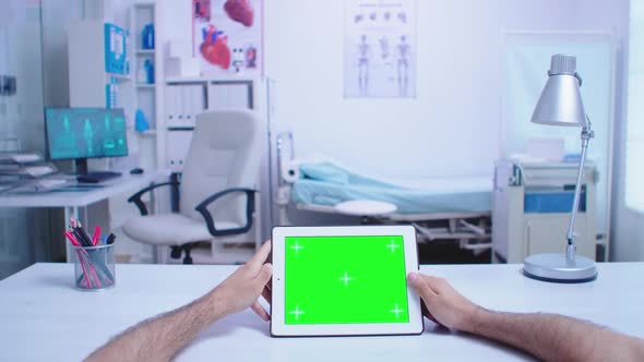 Pov Shot of Assistant Holding Tablet Pc