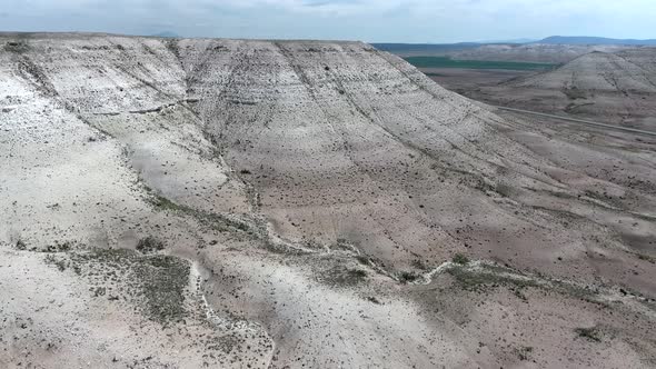 Limestone Mesa Hill Topography on Plain in Arid Barren Geography