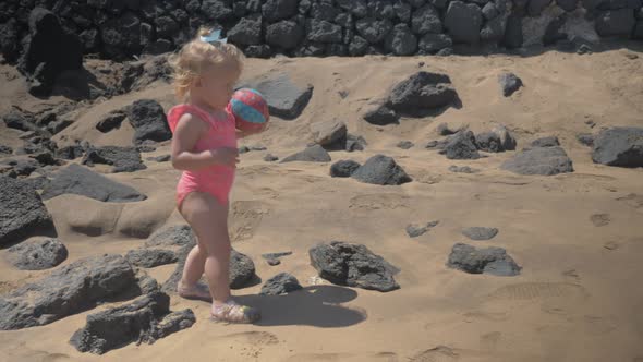 Little Girl Walking at the Beach