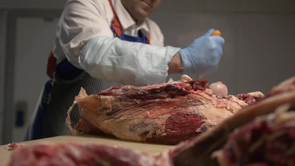 Meat Processing Plant Butcher Cuts Beef Carcasses Meat Production and Food Industry the Process of