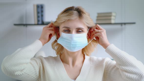 Young woman wearing a face mask against air pollution and covid19 coronavirus