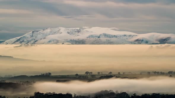 Cloud inversion cloaks Cumbria's Eden Valley in a beautiful winters scene, with snow-covered North L