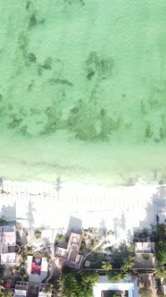 Vertical Video Boats in the Ocean Near the Coast of Zanzibar Tanzania