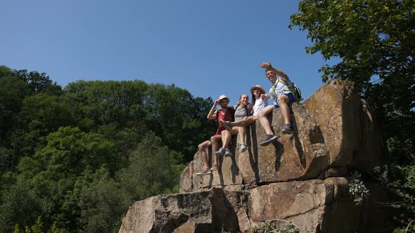 Excited Hikers Posing for Selfie on Mountain Top