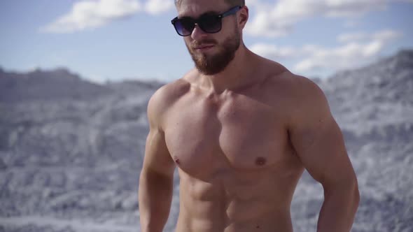 Bearded sportsman in sunglasses