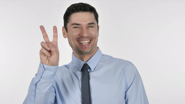 Excited Businessman Gesturing  Victory Sign