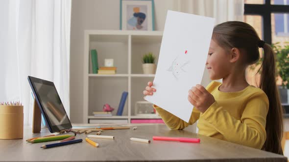 Girl Drawing and Having Video Call on Tablet Pc