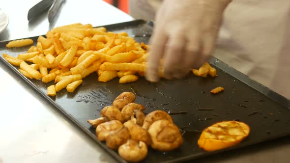 Chef Serves Food