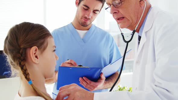 Male doctor examining a patient