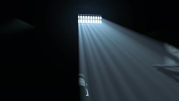Dark old cell interior with barred up window. Sun rays coming through the fog.
